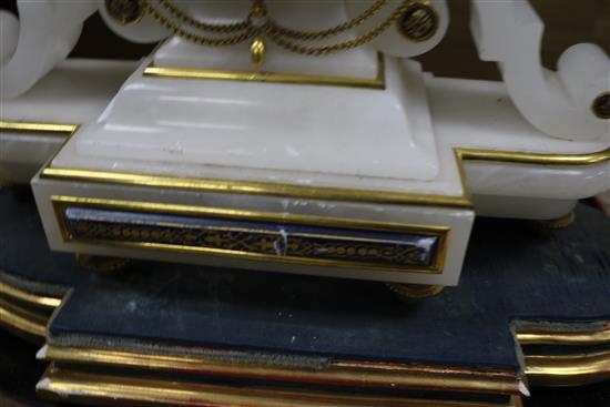A 19th century French alabaster mantel timepiece H.43cm.